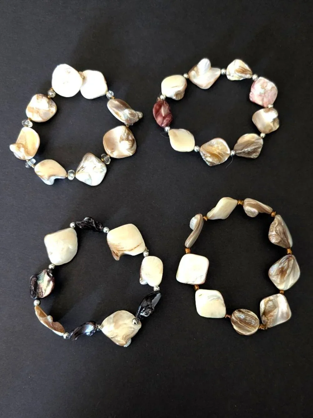 Set of 4 polished shell stretch bracelets-neutral tones